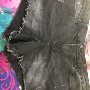 Washed out black shorts